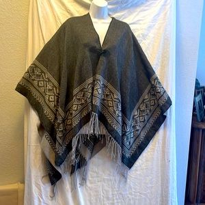 Elan fringe cape